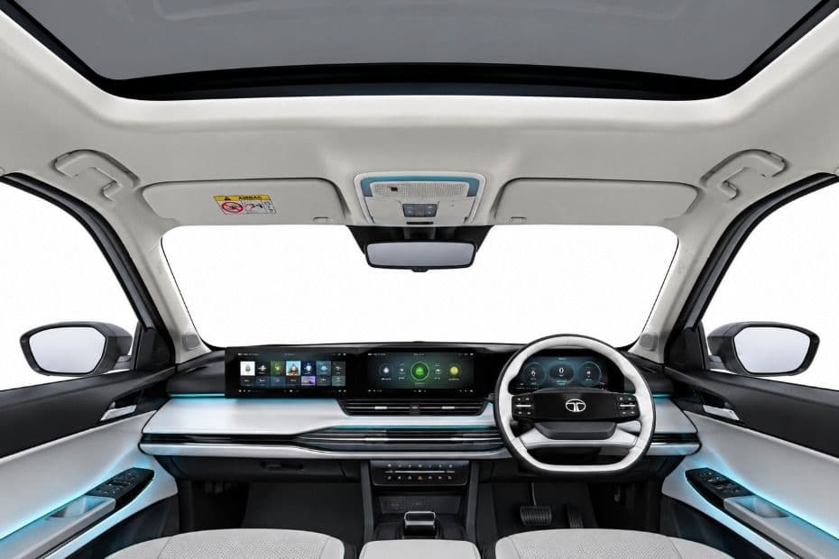 Tata Sierra EV dashboard with panoramic glass roof and integrated digital displays