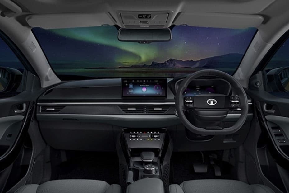 Full dashboard showing the infotainment screen, instrument cluster and central controls