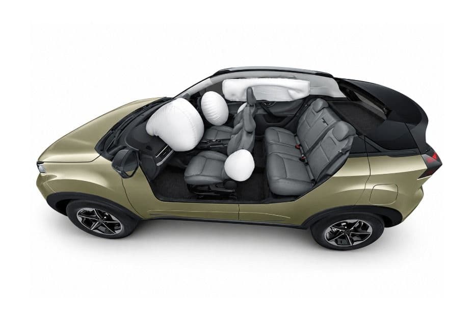 Side view showing six airbags deployed inside the cabin