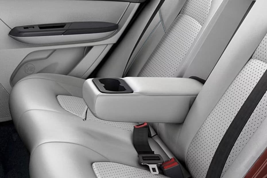 Fold-down rear armrest with integrated cupholders
