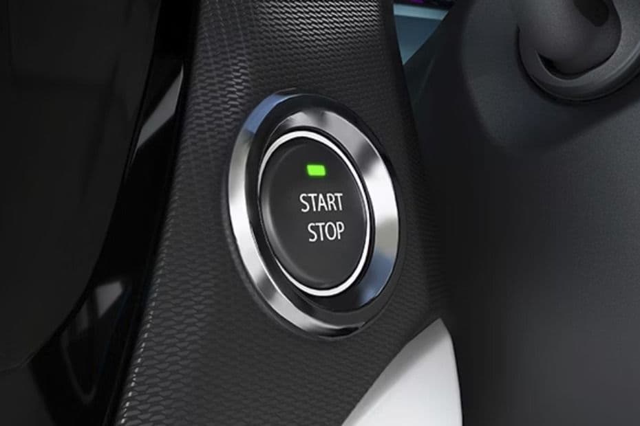 Push-button start-stop switch positioned within easy reach of the driver