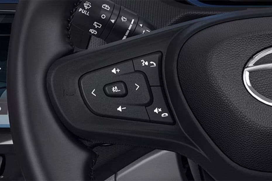 Steering-mounted controls for convenient access to key functions